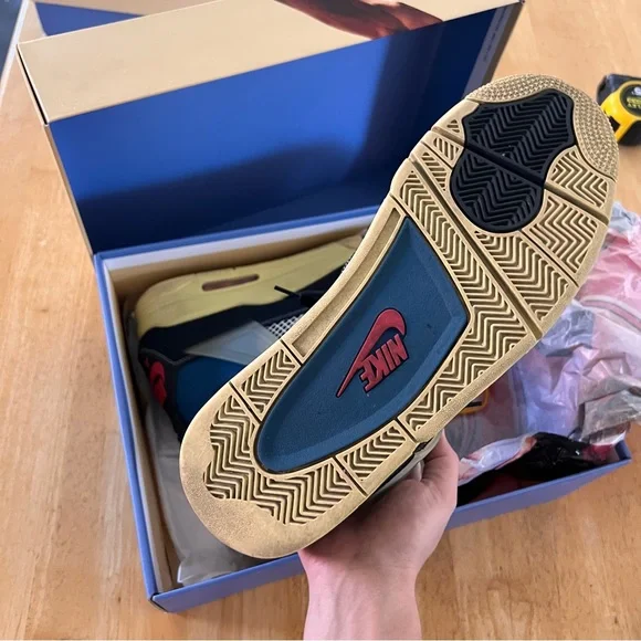 Air Jordan 4 Retro Low-Top in Black with Blue and Red Accents - Picture 8 of 11